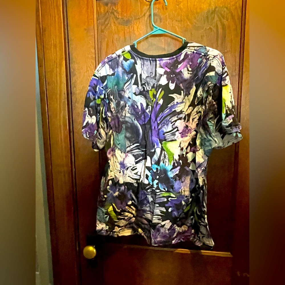 Multi color tee shirt.